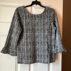 Nice heavy material with some stretch to it. Looks nice with dress pants